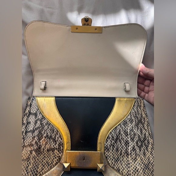 Gucci
Python Medium Osiride Top Handle Bag - Picture 8 of 10